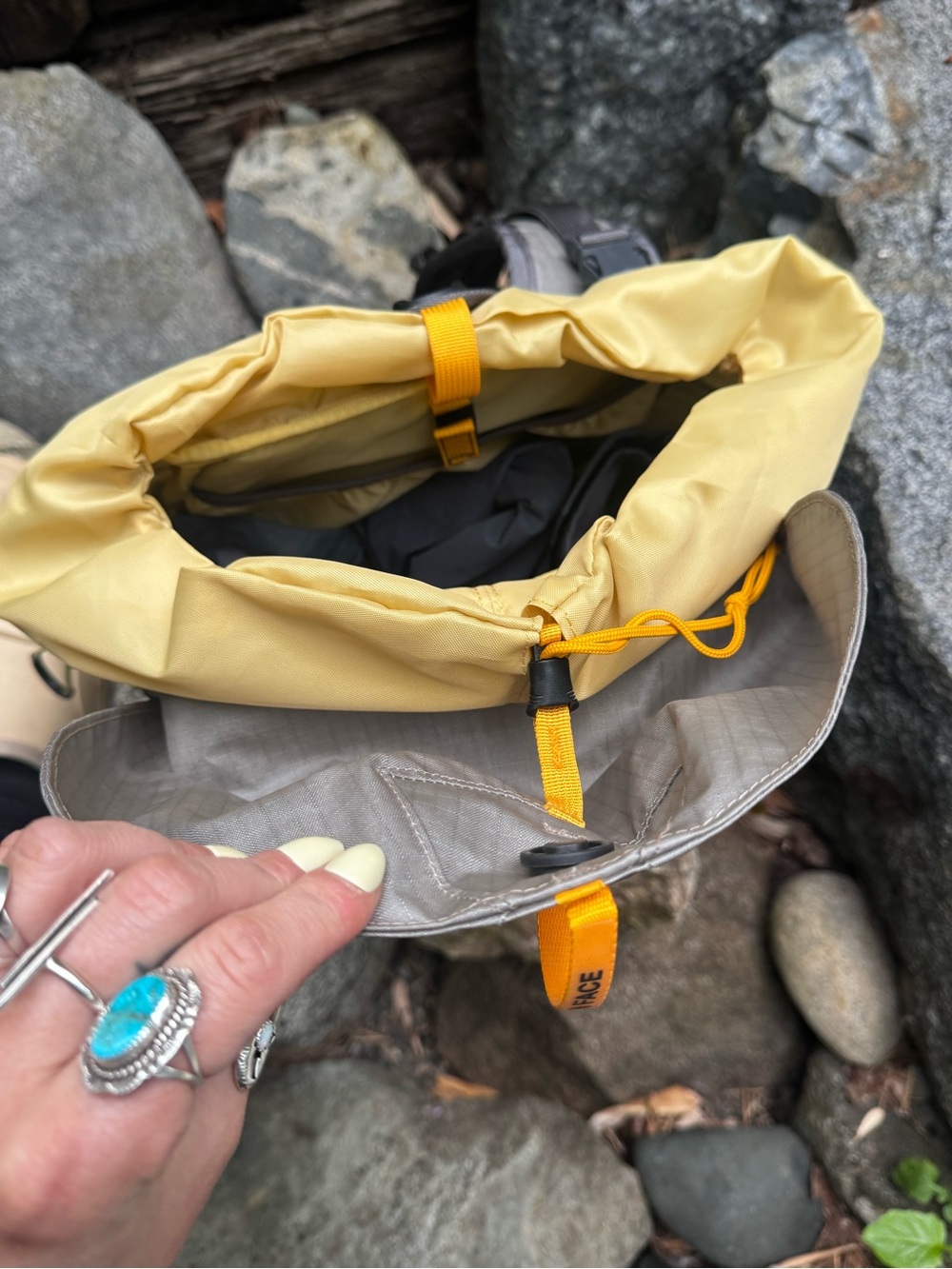 The North Face Olive Green and Black Roll-Top Backpack with Yellow Accents - Picture 10 of 12